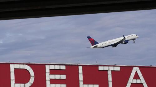 FILE - A Delta Air Lines plane takes off from Hartsfield-Jackson Atlanta International Airport in Atlanta, Nov. 22, 2022. A consumer class action lawsuit filed Tuesday, May 30, 2023, claims Delta Air Lines inaccurately billed itself as the world's “first carbon-neutral airline” and should pay damages. The complaint in California federal court alleges the airline relied on carbon offsets that were largely bogus. (AP Photo/Brynn Anderson, File)