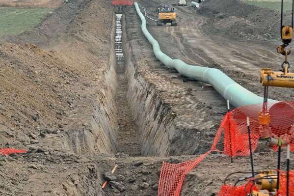 FILE - In this October 2016, file photo, construction continues on the Dakota Access Pipeline. Federal officials on Friday, Sept. 8, 2023, released a draft environmental review of the Dakota Access oil pipeline without a recommendation from five options for the future of the line's controversial river crossing in North Dakota, proposals which include an extensive reroute miles upstream. (Tom Stromme/The Bismarck Tribune via AP, File)