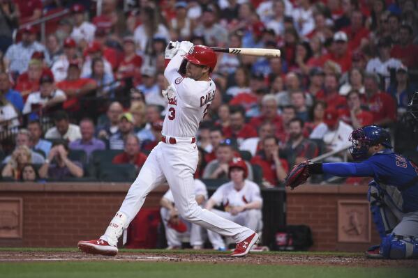 St. Louis Cardinals' Dylan Carlson watches his RBI-single during the third inning of a baseball game against the Chicago Cubs, Monday, July 19, 2021, in St. Louis. (AP Photo/Joe Puetz)