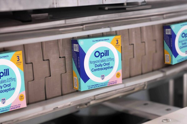 This image provided by Perrigo Company shows boxes of Opill, the first over-the-counter birth control pill available later this month in the United States. Manufacturer Perrigo said Monday, March 4, 2024 that it has begun shipping the medication, called Opill, to major retailers and pharmacies. (Perrigo Company via AP)