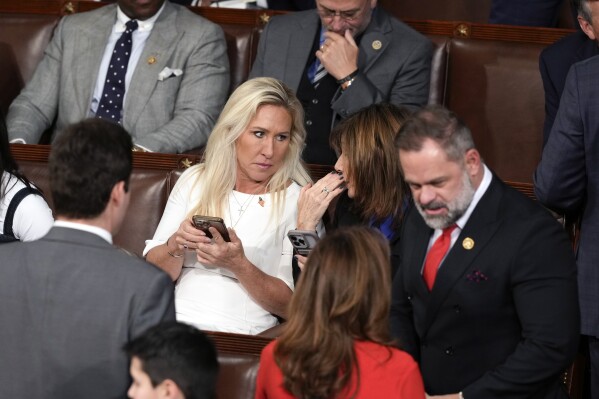 Rep. Marjorie Taylor Greene, R-Ga., seen as the House of Representatives convenes the 119th Congress with a slim Republican majority, at the Capitol in Washington, Friday, Jan. 3, 2025. (AP Photo/J. Scott Applewhite)