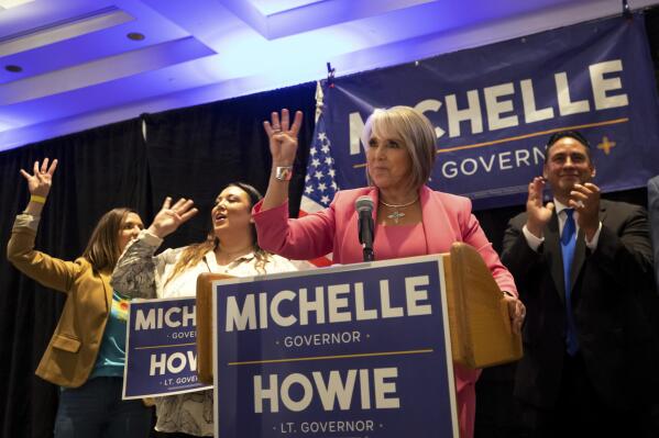 Re-elected New Mexico Gov. Michelle Lujan Grisham speaks to supporters in Albuquerque, N.M., Tuesday, Nov. 8, 2022. The Democratic incumbent beat Republican candidate Mark Ronchetti. (AP Photo/Andres Leighton)