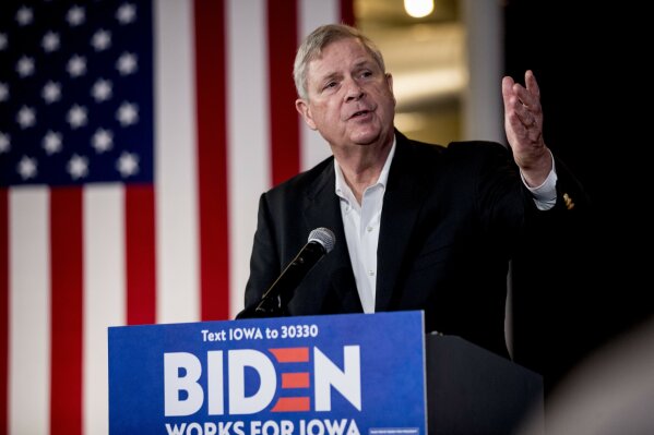 FILE - In this Jan. 31, 2020 file photo, former ecretary of Agriculture Tom Vilsack speaks at a campaign stop for Democratic presidential candidate former Vice President Joe Biden at the LOFT on Jefferson, in Burlington, Iowa. President-elect Joe Biden has selected Vilsack to reprise that role in his administration.  (AP Photo/Andrew Harnik, File)
