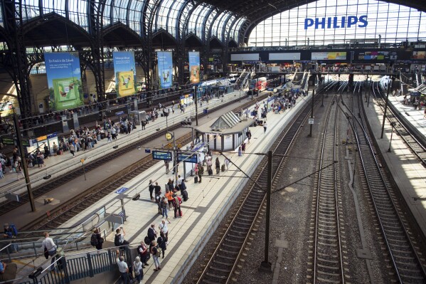 Some tracks at Hamburg Central Station are temporarily empty during various train cancellations and delays in Hamburg, Friday Sept. 8, 2023. A series of fires hit railway infrastructure in the German city of Hamburg overnight, causing widespread disruption to trains between Hamburg and Berlin and between the port city and the Baltic Sea coast. Police said they suspect that the damage was politically motivated. (Gregor Fischer/dpa via AP)