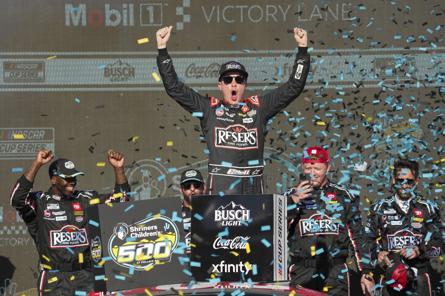 Christopher Bell holds off Denny Hamlin at Phoenix to win third straight NASCAR Cup Series race
