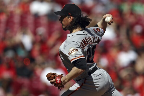 
              San Francisco Giants' Jeff Samardzija throws in the first inning of a baseball game against the Cincinnati Reds, Sunday, May 5, 2019, in Cincinnati. (AP Photo/Aaron Doster)
            