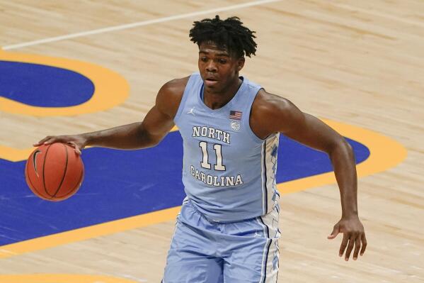 FILE - In this Jan. 26, 2021, file photo, North Carolina's Day'Ron Sharpe (11) plays against Pittsburgh during an NCAA college basketball game in Pittsburgh. Sharpe is a potential first-round NBA draft prospect after a season with the Tar Heels. (AP Photo/Keith Srakocic, File)