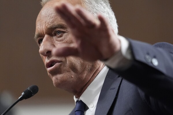 Robert F. Kennedy Jr., President Donald Trump's choice to be Secretary of Health and Human Services, appears before the Senate Finance Committee for his confirmation hearing at the Capitol in Washington, Wednesday, Jan. 29, 2025. (AP Photo/J. Scott Applewhite)