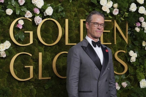 Guy Pearce arrives at the 82nd Golden Globes on Sunday, Jan. 5, 2025, at the Beverly Hilton in Beverly Hills, Calif. (Photo by Jordan Strauss/Invision/AP)