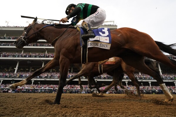 Brian Hernandez Jr. rides Mystic Dan across the finish line to win the 150th running of the Kentucky Derby at Churchill Downs on Saturday, May 4, 2024 in Louisville, Kentucky (AP Photo/Jeff Roberson)