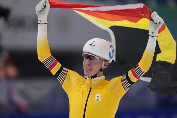 Bart Swings of Belgium reacts after winning the gold medal in the men's speedskating mass start finals at the 2022 Winter Olympics, Saturday, Feb. 19, 2022, in Beijing. (AP Photo/Sue Ogrocki)