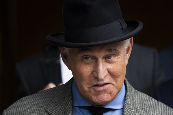 FILE - In this Nov. 12, 2019, file photo Roger Stone leaves federal court in Washington. A federal judge is giving Stone, a longtime ally and confidant of President Donald Trump, an additional two weeks before he must report to serve his federal prison sentence. (AP Photo/Manuel Balce Ceneta, File)
