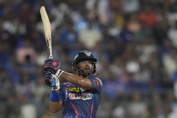 Lucknow Super Giants' Nicholas Pooran plays a shot during the Indian Premier League cricket match between Mumbai Indians and Lucknow Super Giants in Mumbai, India, Friday, May 17, 2024.(AP Photo/ Rafiq Maqbool)