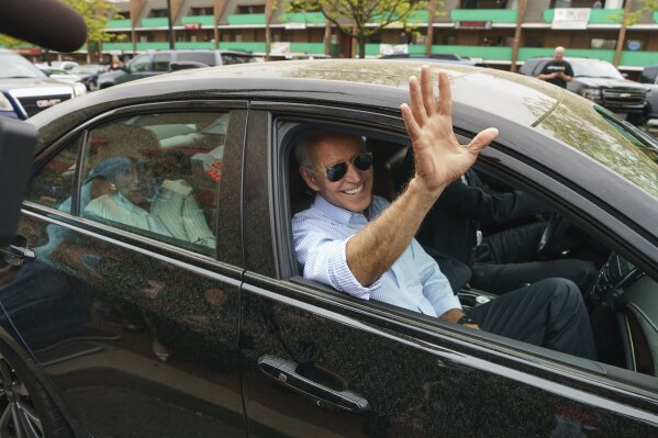 
              Democratic presidential candidate and former Vice President Joe Biden waves goodbye after stopping at Gianni's Pizza, in Wilmington Del., Thursday, April 25, 2019. Jessica Griffin/The Philadelphia Inquirer via AP)
            