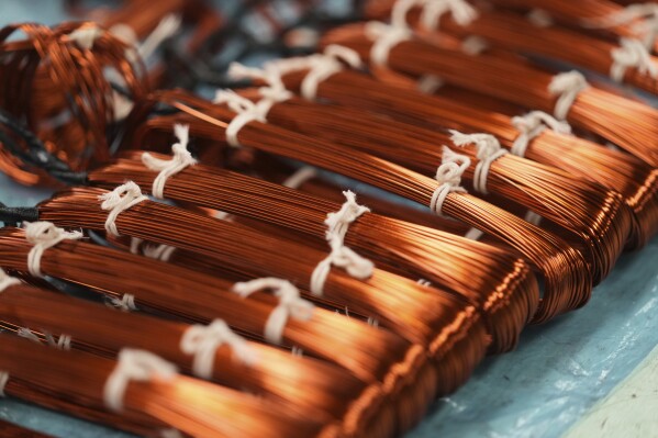 Bundles of copper cables sit at a plant that produces parts for large electric vehicles in Mexico City, on April 2, 2025. (AP Photo/Fernando Llano, File)