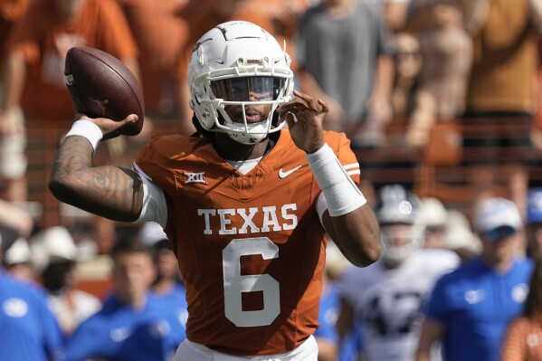 Texas quarterback Maalik Murphy (6) looks to throw against BYU during the first half of an NCAA college football game in Austin, Texas, Saturday, Oct. 28, 2023. (AP Photo/Eric Gay)