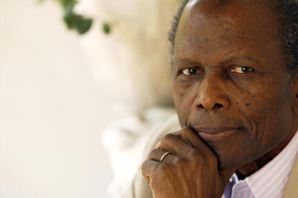 REMOVES REFERENCE TO THE BAHAMAS - FILE - Actor Sidney Poitier poses for a portrait in Beverly Hills, Calif. on June 2, 2008.  Poitier, the groundbreaking actor and enduring inspiration who transformed how Black people were portrayed on screen, became the first Black actor to win an Academy Award for best lead performance and the first to be a top box-office draw, died Thursday, Jan. 6, 2022. He was 94. (AP Photo/Matt Sayles, File)