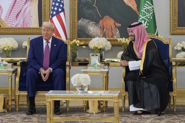 President Donald Trump and Saudi Crown Prince Mohammed bin Salman speak during a coffee ceremony at the Royal Terminal of King Khalid International Airport in Riyadh, Saudi Arabia, Tuesday, May 13, 2025. (AP Photo/Alex Brandon)