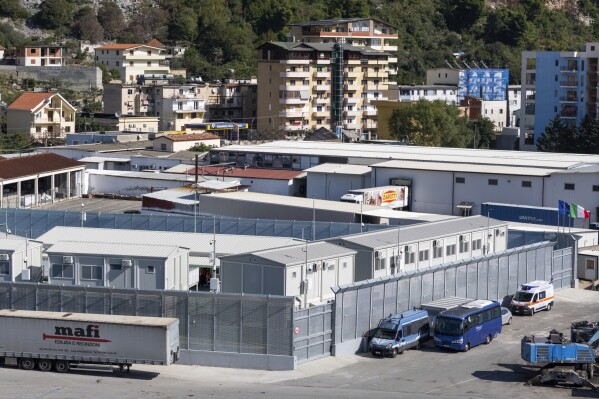 A view of a migrant processing center at the port of Shengjin, northwestern Albania Wednesday, Oct. 16, 2024, as the first group of migrants who were intercepted in international waters arrived Wednesday. (AP Photo/Vlasov Sulaj)