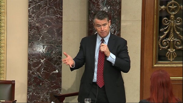 This image from Senate Television video shows Sen. Todd Young, R-Ind., speaking on the Senate floor Wednesday, Nov. 1, 2023. (Senate Television via AP)