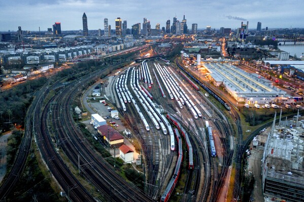 Trains are parked outside the central train station in Frankfurt, Germany, Tuesday, March 12, 2024. German train drivers union GDL called for another strike on Tuesday. (AP Photo/Michael Probst)
