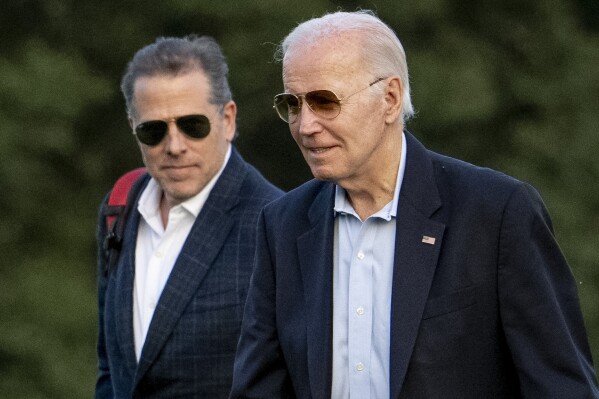 FILE - President Joe Biden, and his son Hunter Biden arrive at Fort McNair, Sunday, June 25, 2023, in Washington. Hunter Biden has been charged with felony gun possession. A federal indictment filed in Delaware says Biden lied about his drug use when he bought a firearm in 2018 while struggling with addiction to crack cocaine. (AP Photo/Andrew Harnik, File)