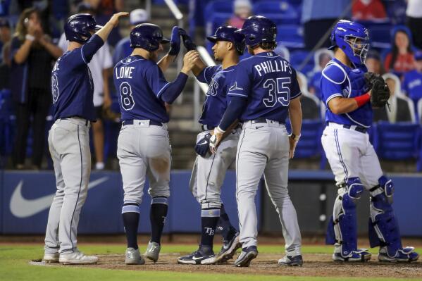 Brett Phillips of the Tampa Bay Rays celebrates after hitting a