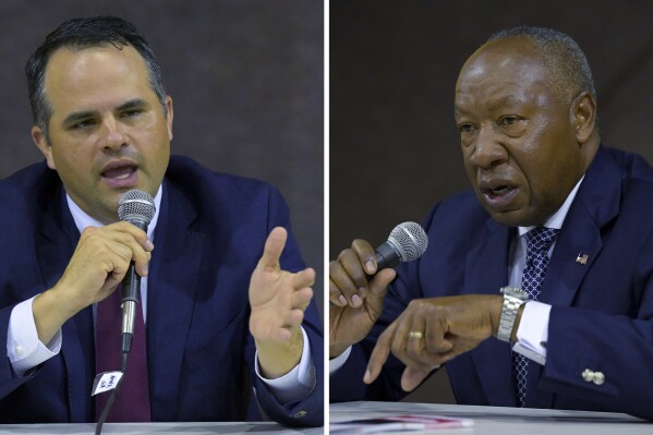 Candidates for Caddo Sheriff John Nickelson, left, and Henry Whitehorn Sr. speak during a forum held by the Broadmoor Neighborhood Association at Broadmoor Presbyterian Church in Shreveport, La., Tuesday, Oct. 10, 2023. Whitehorn, a Democrat, won the Nov. 18 election for Caddo Parish Sheriff by one vote, according to results from the Secretary of State’s office. (Jill Pickett/The Advocate via AP)