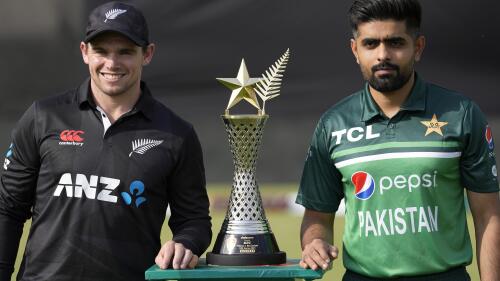 New Zealand's skipper Tom Latham, left, and his Pakistani counterpart Babar Azam pose for photo with the trophy of one-day international cricket matches series, in Rawalpindi, Pakistan, Wednesday, April 26, 2023. (AP Photo/Anjum Naveed)