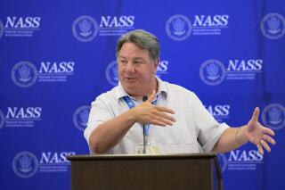 FILE - Louisiana Secretary of State Kyle Ardoin hosts the summer conference of the National Association of Secretaries of State in Baton Rouge, La., July 8, 2022. The Republican announced on Tuesday, April 11, 2023, that he will not seek re-election. (AP Photo/Matthew Hinton, File)