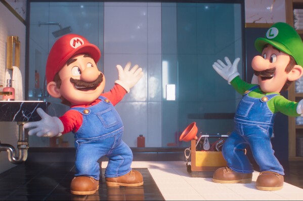 This image released by Nintendo and Universal Studios shows characters, Mario, voiced by Chris Pratt, left, and Luigi, voiced by Charlie Day from the animated film "The Super Mario Bros. Movie." (Nintendo and Universal Studios via AP)