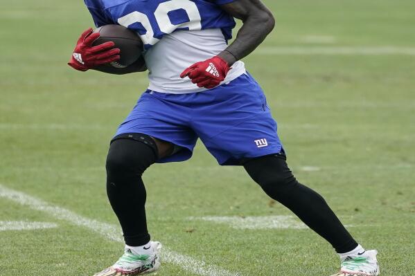 New York Giants wide receiver Kadarius Tomey (89) runs a play during training camp at the NFL football team's practice facility, Friday, July 29, 2022, in East Rutherford, N.J. (AP Photo/John Minchillo)