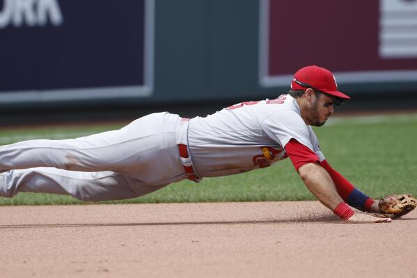 St. Louis Cardinals third baseman Nolan Arenado dives but is unable to come up with a ground ball hit by Kansas City Royals' Emmanuel Rivera during the fifth inning of a baseball game at Kauffman Stadium in Kansas City, Mo., Sunday, Aug. 15, 2021. (AP Photo/Colin E. Braley)