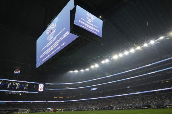 The CONCACAF Nations League final soccer match between Mexico and the United States is stopped due to discriminatory chants during the second half Sunday, March 24, 2024, in Arlington, Texas. (AP Photo/Tony Gutierrez )