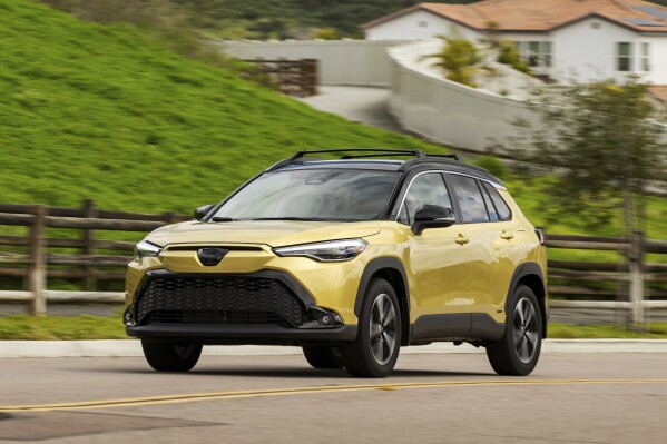 This photo provided by Toyota shows the 2024 Corolla Cross Hybrid. It has standard all-wheel drive and gets up to an EPA-estimated 42 mpg combined. (Courtesy of Toyota Motor Sales U.S.A. via AP)