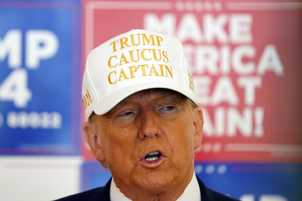 Republican presidential candidate former President Donald Trump speaks to volunteers at Hotel Fort Des Moines in Des Moines, Iowa, Sunday, Jan. 14, 2024. (AP Photo/Andrew Harnik)