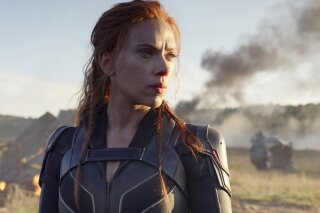 This image released by Disney/Marvel Studios' shows Scarlett Johansson in a scene from "Black Widow." Disney announced the film release date as July 9, 2021. (Marvel Studios/Disney via AP)
