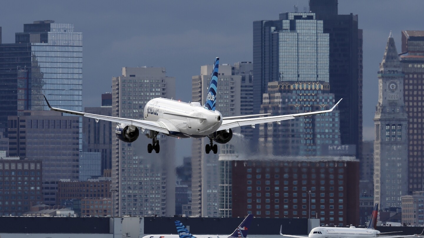 JetBlue passenger all of sudden opens go out door as flight is taxiing for takeoff at Boston airport