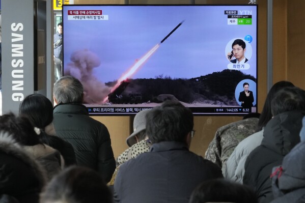 A TV screen shows a file image of North Korea's missile launch during a news program at the Seoul Railway Station in Seoul, South Korea, Tuesday, Jan. 30, 2024. North Korea fired multiple cruise missiles into waters off its western coast Tuesday in its third launch of such weapons this month, South Korea's military said, as the North continues to flaunt its expanding arsenal of weapons designed to overwhelm its rivals defenses. (AP Photo/Ahn Young-joon)