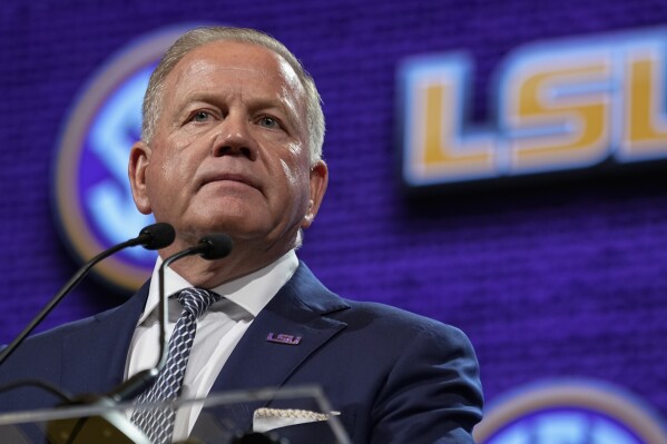 LSU Tigers head coach Brian Kelly speaks during the NCAA college football Southeastern Conference Media Days, Monday, July 17, 2023, in Nashville, Tenn. (AP Photo/George Walker IV)