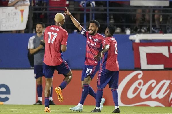 FC Dallas forward Jesús Ferreira (10) celebrates his goal against the Vancouver Whitecaps with Jáder Obrian (8) and Nkosi Tafari (17) during the second half of an MLS soccer match Wednesday, May 17, 2023, in Frisco, Texas. (AP Photo/LM Otero)