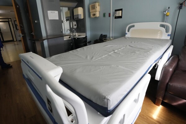 One of the empty beds in the Alliance Healthcare System hospital in Holly Springs, Miss., is seen on Feb. 29, 2024. The medical facility was initially approved by the federal government as a rural emergency hospital in March, 2023, requiring closing all inpatient beds and providing 24/7 emergency care. However, they have been denied the status and must now transition back to a full-service hospital. (AP Photo/Rogelio V. Solis)