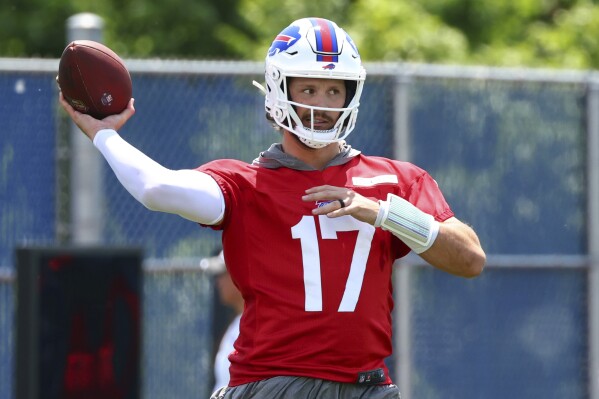 Buffalo Bills Josh Allen (17) throws a pass during practice at NFL football minicamp in Orchard Park, N.Y., Tuesday June 10, 2025. (AP Photo/Jeffrey T. Barnes)