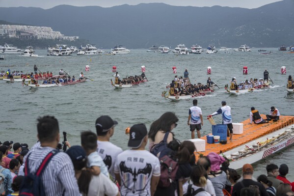 Competitors take part in the Stanley International Dragon Boat Championships to celebrate the Dragon Boat Festival in Hong Kong, Saturday, May 31, 2025. (AP Photo/Chan Long Hei)