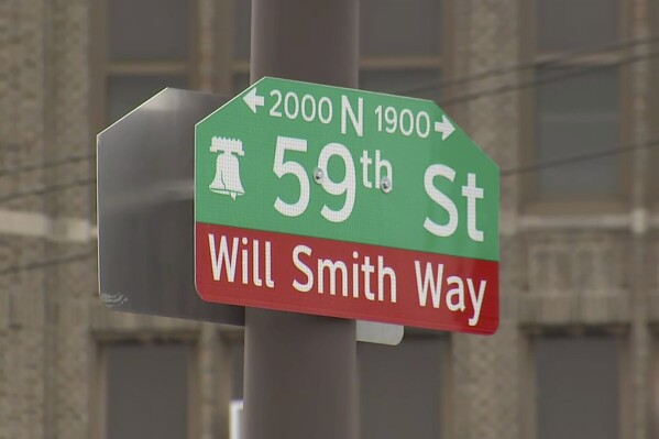 A sign at the intersection of North 59th Street and Lancaster Avenue in West Philadelphia has been renamed after Will Smith on Wednesday, March 26, 2025. (WPVI-TV via AP)