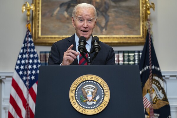 FILE - President Joe Biden speaks on student loan debt forgiveness, in the Roosevelt Room of the White House, Oct. 4, 2023, in Washington. Americans who are struggling to repay federal student loans because of financial hardship could get some of their debt canceled under President Joe Biden's latest attempt at forgiveness, the Education Department announced Thursday, Feb. 15, 2024. (AP Photo/Evan Vucci)