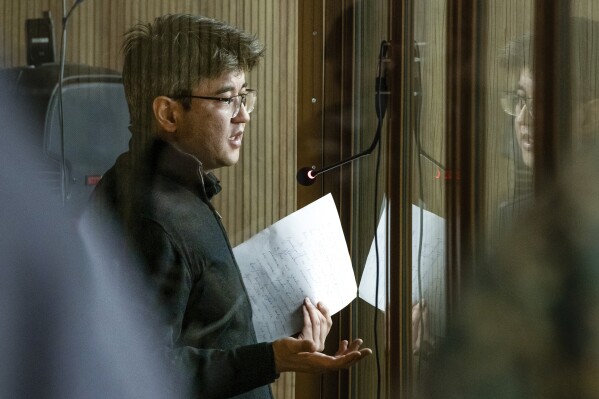 FILE - Kuandyk Bishimbayev, Kazakhstan's former economics minister, speaks during his trial in Astana, Kazakhstan on Monday, May 6, 2024. Kazakhstan's Supreme Court on Monday, May 13, 2024, convicted Bishimbayev of torturing and brutally murdering his wife and sentenced him to 24 years in prison, concluding a high-profile trial that has gripped the Central Asian nation. (AP Photo/Alimzhan Barangulov, File)
