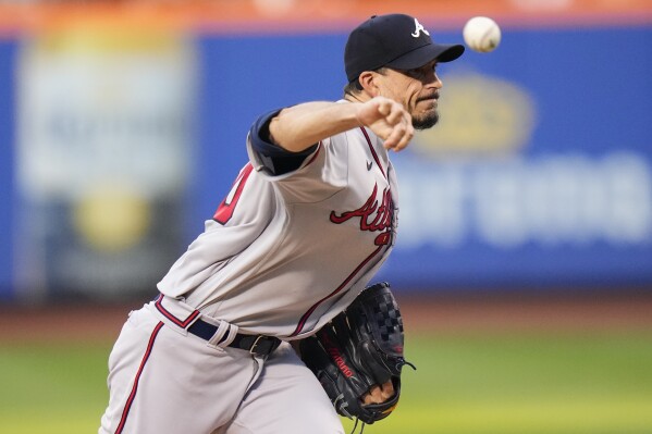 Atlanta Braves' Charlie Morton pitches during the first inning of a baseball game against the New York Mets Friday, Aug. 11, 2023, in New York. (AP Photo/Frank Franklin II)