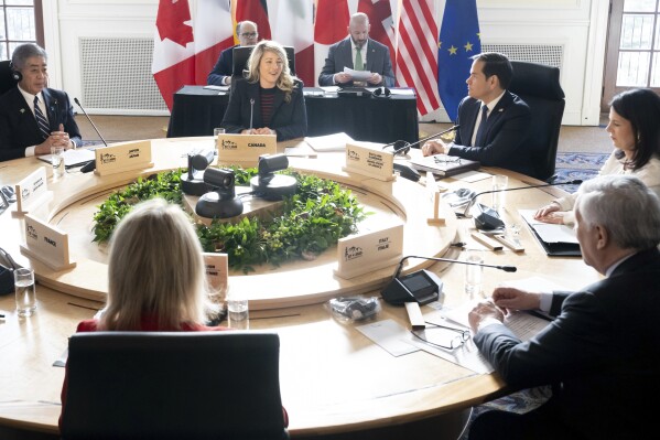 From left, Japanese Foreign Minister Iwaya Takeshi, Canadian Foreign Minister Melanie Joly, US Secretary of State Marco Rubio, German Foreign Minister Annalena Baerbock, Italian Foreign Minister Antonio Tajani and EU foreign policy chief Kaja Kallas attend the G7 foreign ministers meeting in La Malbaie, Canada, Friday March 14, 2025. (Saul Loeb, Pool Photo via AP)