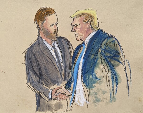 Former President Donald Trump, right, shakes his son Eric Trump's hand as he walks out of the courtroom in Manhattan Criminal Court, Thursday, May 30, 2024, in New York. Donald Trump became the first former president to be convicted of felony crimes as a New York jury found him guilty of 34 felony counts of falsifying business records in a scheme to illegally influence the 2016 election through hush money payments to a porn actor who said the two had sex. (Elizabeth Williams via AP)